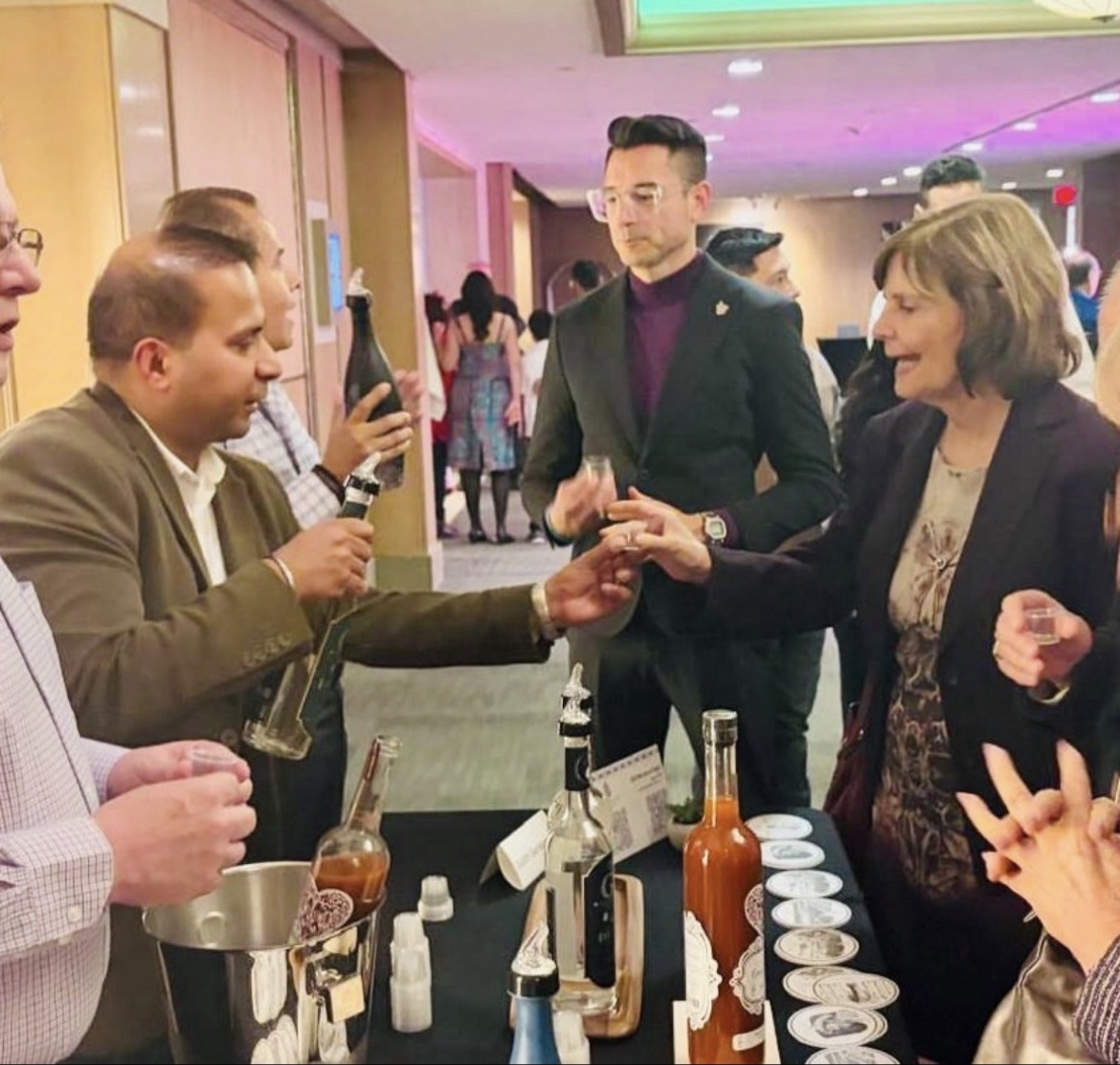 Brutos mezcal tasting with guests, Javier at the center