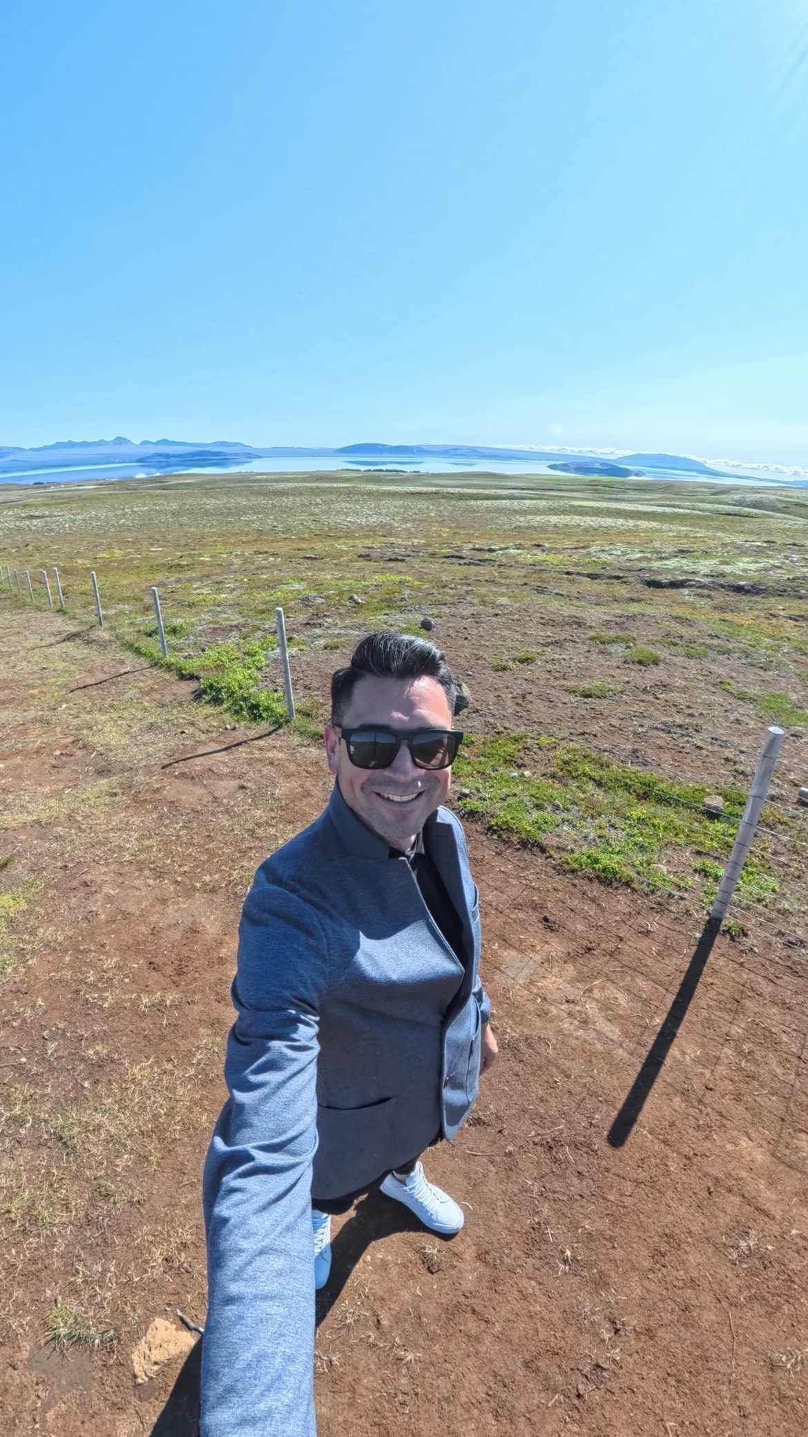 Javier selfie with a lake and mountains in Iceland